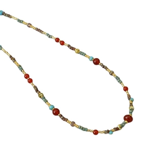 Ethnic beaded necklace with red agate beads and turquoise accents in vintage Dunhuang style