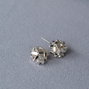 Minimalist silver geometric hollow ball stud earrings with multi-faceted sphere design