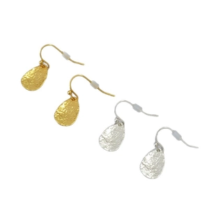 Handcrafted brass leaf teardrop earrings in gold and silver finish with hammered texture
