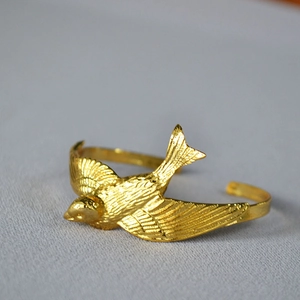 Exquisite gold-plated brass swallow bird open cuff bracelet with adjustable wing design