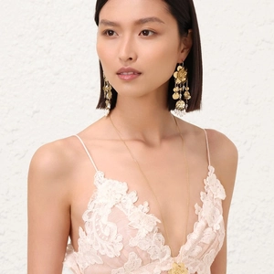 Elegant gold flower drop earrings with white pearl tassels and long floral necklace set
