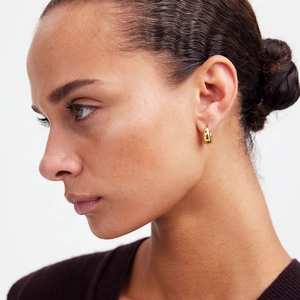 Polished chunky gold hoop earrings for women featuring a minimalist French design