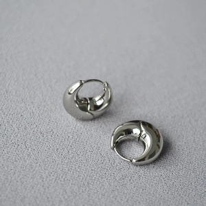 French style polished silver drop hoop earrings with a sleek mirror finish on grey stone