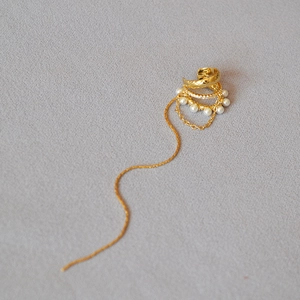 Elegant gold layered ear cuff with white pearls and long tassel chain for women