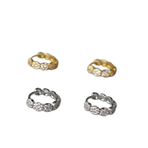 Sparkling pave zirconia mini hoop earrings set in polished gold and silver finishes