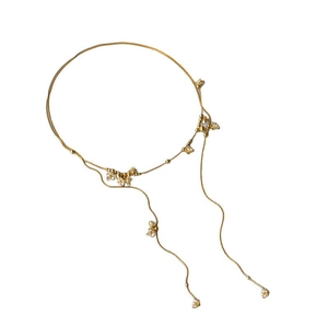 Lunga collana con nappine dorate, ciondoli a fiori di cristallo e catene a doppio strato