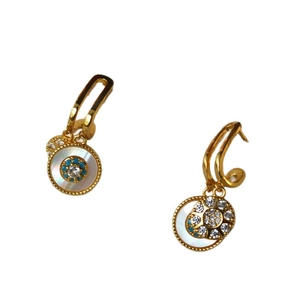 Golden drop earrings with white shell eye pendant and sparkling cubic zirconia stones
