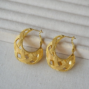 Elegant gold plated hollow mesh grid hoop earrings with intricate woven texture finish