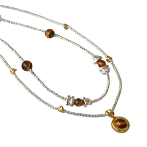 Double-layered tiger eye stone beaded necklace with silver chain and gold pendant