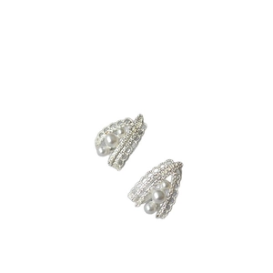 French vintage silver lace earrings with sparkling diamonds and white pearls on white background