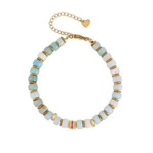 Detail of gold stainless steel bracelet with blue beads and heart pendant engraving