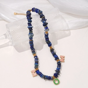 Lapis lazuli beaded necklace with MOM charm and gold chain in elegant setting