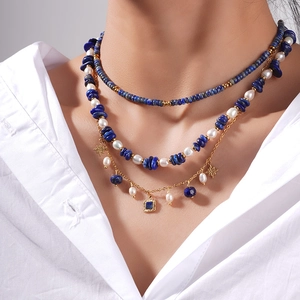 Three-layer bohemian necklace set with blue lapis lazuli, pearls, and star charm pendants