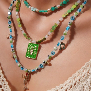 Bohemian multi-layer necklace with evil eye, turquoise heart and mermaid pendant