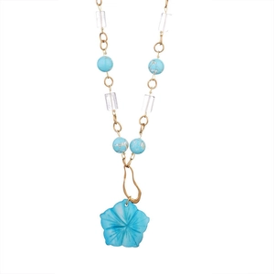 Collana con perle di turchese blu, grande pendente a fiore e cristalli bianchi