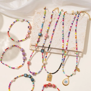 Bohemian colorful seed bead jewelry set with evil eye charms on stones and silk
