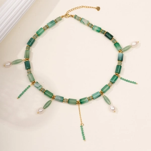 Detail of green agate beaded choker with pearls, golden spacers, and adjustable heart clasp