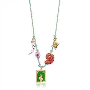 Detail of colorful woven rope necklace with shell pendants and Fatima hand charms