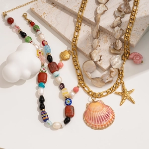 Bohemian seashell and starfish beaded necklace with stainless steel Figaro chain for beach vacation