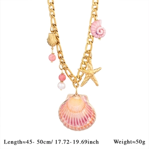 Chunky gold chain necklace with large striped shell, starfish and bead pendants