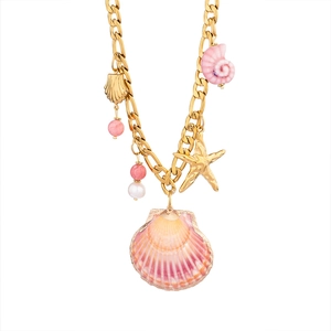 Gold Figaro chain necklace with seashell and starfish pendants for beach vacation style