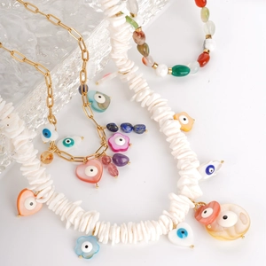 Bohemian beaded necklace with white shell chips and colorful evil eye heart charms