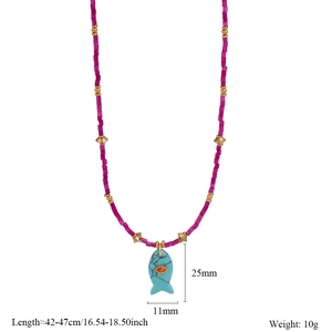 Detail of beaded fish necklace with turquoise stone pendant and size measurements