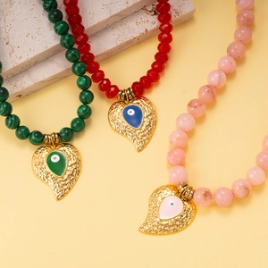 Handmade beaded necklaces with malachite beads and golden evil eye heart pendants