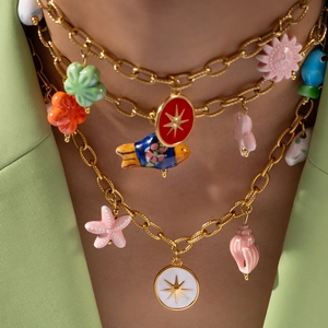 Bohemian gold chain necklace with colorful starfish and floral ceramic pendants