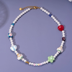 Beaded pearl necklace featuring colorful ANGEL letters, heart charms, and evil eye details