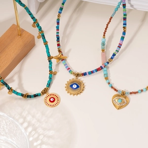 Bohemian Evil Eye beaded necklace set with turquoise heart and star charms on stainless steel