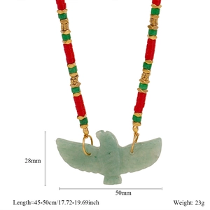 Detailed view of handmade eagle pendant with green aventurine stone and colorful beads