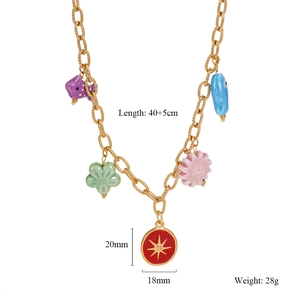 Detail view of colorful enamel charms on gold chain with dimensions 40+5cm and 28g weight