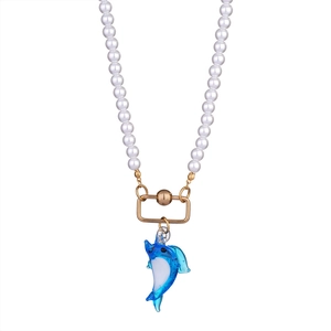 Marine style pearl necklace featuring a blue dolphin pendant and cat eye stone details