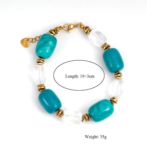 Detail of beaded bracelet with turquoise stones and heart charm, 19+3cm length