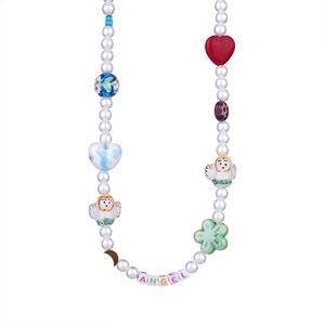 Colorful beaded necklace with white pearls, ceramic figurines, and ANGEL letter beads