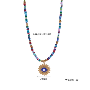 Detailed view of evil eye sun pendant on bohemian beaded necklace with size dimensions