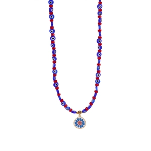 Macro detail of evil eye beads and golden teardrop pendant with flower pattern