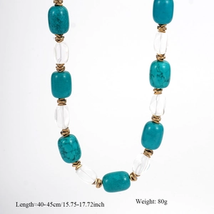 Close-up of beaded necklace with turquoise-style beads and gold spacers, 40-45cm length