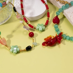 Colorful beaded necklaces with seahorse and flower pendants in tropical beach style