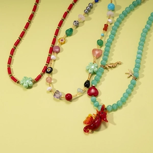 Bohemian stainless steel necklace featuring colorful beads, sea horse and starfish charms