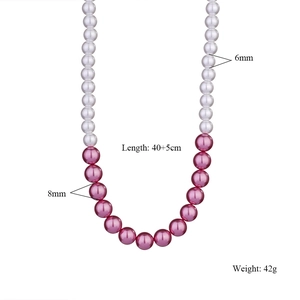 Detail view showing 6mm and 8mm pink and white pearl beads necklace with 40cm length