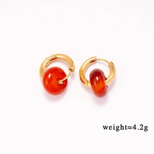 Detail of gold hoops with red natural stone charms and weight info of 4.2g