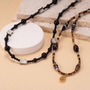 Natural black agate and tiger eye beaded necklaces with shell and cat head pendants