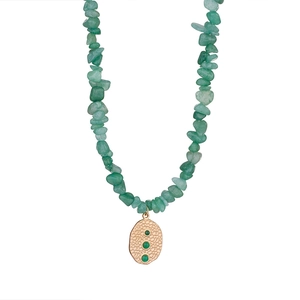Green crystal bead necklace with gold hammered oval pendant and three green gemstones