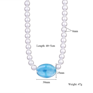 Detail view of pearl necklace with blue oval pendant and 40+5cm length measurements
