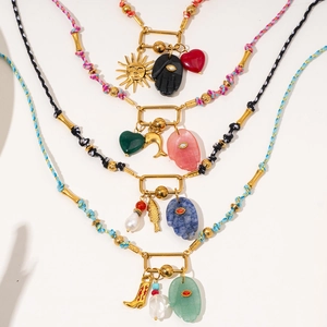 Colorful woven cord necklace with 18k gold hamsa hand and natural stone pendants