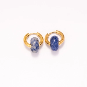 Detailed view of 18k gold plated stainless steel hoops with blue sodalite stone charms