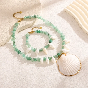 Natural aventurine beaded necklace and bracelet set with shell pendant and gold trim