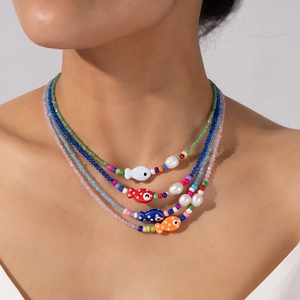 Collier de Perles Colorées en Acier Titane Bohème pour Femme Avec Perle Artificielle et Pendentif Poisson Bijoux de Vacances